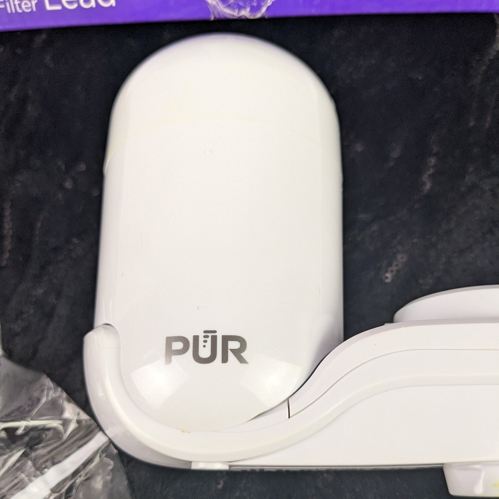 PRE-OWNED, PUR VERTICAL MOUNT WATER FILTER.